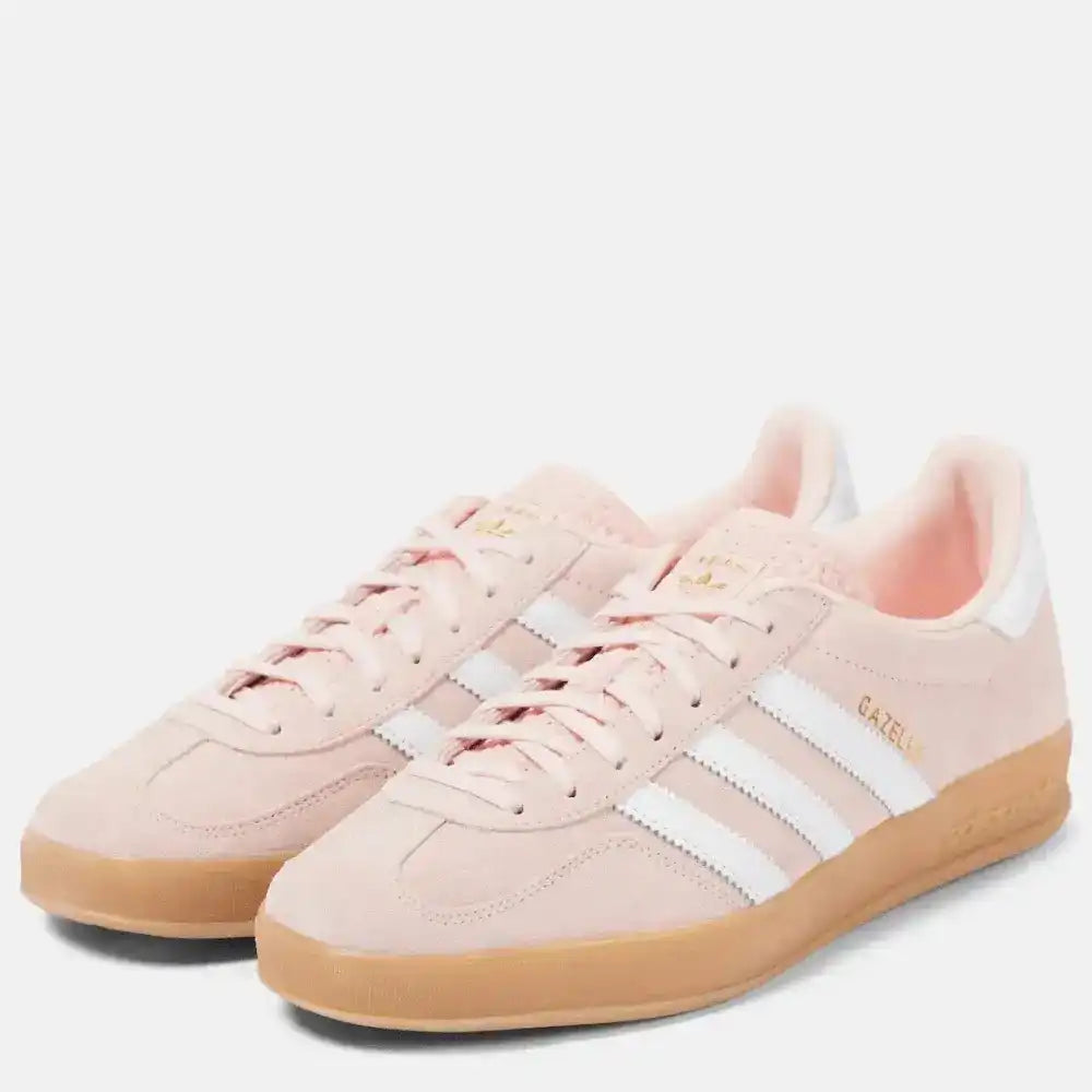 Front view of Adidas Gazelle light pink suede sneakers with gum sole
