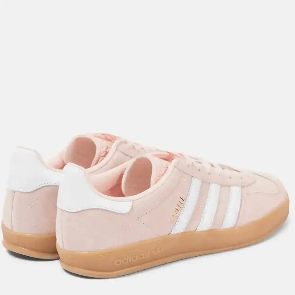 Rear heel view of Adidas Gazelle light pink suede sneakers with gum sole
